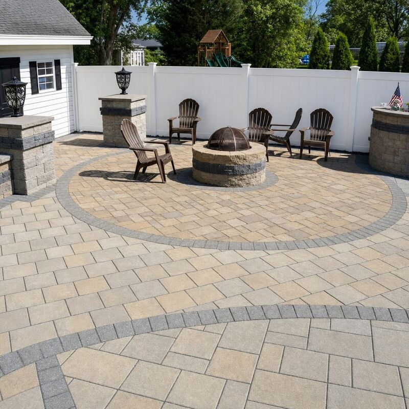 Stamped concrete patio with a built-in fire pit