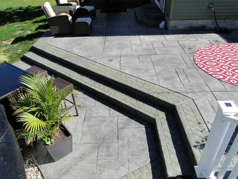 Ashlar stamped patio with diamond-edged steps