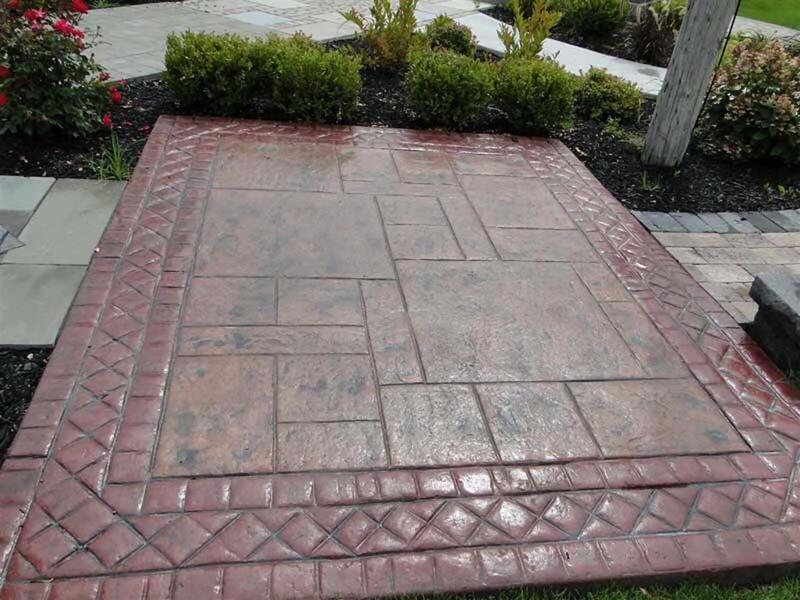 Red stamped ashlar pad with lattice border