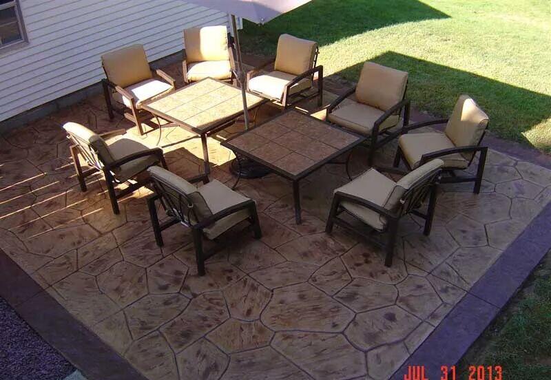 Tan flagstone patio with furniture from above