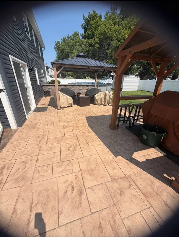 Tan ashlar stamped patio gazebo pergola pool